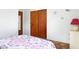 Bedroom with patterned bedspread, and plenty of closet space at 760 72Nd N Ave, St Petersburg, FL 33702