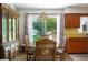 Cozy dining room with traditional wooden furniture and great backyard view at 760 72Nd N Ave, St Petersburg, FL 33702