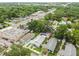 Aerial view featuring the property's setting near commercial areas and green spaces at 904 E Hamilton Ave, Tampa, FL 33604