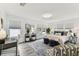 Bright bedroom with lots of windows and space for a desk. Tastefully decorated with lovely furnishings at 904 E Hamilton Ave, Tampa, FL 33604