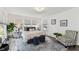 Bright bedroom with lots of windows and space for a desk. Tastefully decorated with lovely furnishings at 904 E Hamilton Ave, Tampa, FL 33604