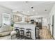 Kitchen featuring bar seating and stainless steel appliances at 904 E Hamilton Ave, Tampa, FL 33604