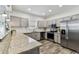 Modern kitchen with stainless steel appliances and ample counter space at 904 E Hamilton Ave, Tampa, FL 33604