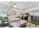 Kitchen with granite countertops and stainless steel appliances at 904 E Hamilton Ave, Tampa, FL 33604