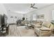 Cozy living room with a view of the dining area and front door at 904 E Hamilton Ave, Tampa, FL 33604