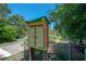 Colorful community library box promoting reading and neighborhood interaction at 917 W Idlewild Ave, Tampa, FL 33604