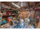 Image of an unfinished cluttered garage space with pegboard and tools at 917 W Idlewild Ave, Tampa, FL 33604