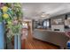 Comfortable living room with hardwood floors, ceiling fan, and decorative accents at 917 W Idlewild Ave, Tampa, FL 33604