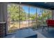 Charming screened porch with views of the landscaped front yard and neighborhood at 917 W Idlewild Ave, Tampa, FL 33604