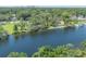 Stunning aerial view of waterfront properties with docks and serene lake at 917 W Idlewild Ave, Tampa, FL 33604