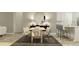 Dining room with neutral decor, a large dining table set for six, adjacent to a kitchen bar at 9542 Minnow Ray Dr, Land O Lakes, FL 34638