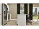 Modern kitchen featuring stainless steel appliances, white cabinets, and an eat-in island at 9542 Minnow Ray Dr, Land O Lakes, FL 34638