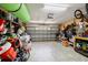 Spacious garage, perfect for storage and vehicles, with an overhead door and ample organizational space at 9831 Edmonton Dr, Land O Lakes, FL 34638