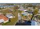 A bird's eye view of this home featuring a pool, boat lift, and proximity to waterfront living at 105 12Th Sw St, Ruskin, FL 33570