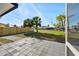 Large backyard with beautiful landscaping, fence, and patio pavers at 105 12Th Sw St, Ruskin, FL 33570