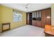 Bedroom with built-in shelves, drawers, cabinets, and an open space for television or decor at 12038 Steppingstone Blvd, Tampa, FL 33635