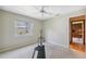 Secondary bedroom with an abundance of light and neutral paint and carpeting at 12038 Steppingstone Blvd, Tampa, FL 33635