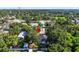 Aerial view of a home surrounded by mature trees, showcasing its neighborhood setting and privacy at 1217 E 29Th Ave, Tampa, FL 33605