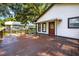 Spacious wooden back deck great for entertaining with a peek at the backyard at 1217 E 29Th Ave, Tampa, FL 33605