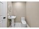 Bathroom with a pedestal sink and tiled floor at 1217 E 29Th Ave, Tampa, FL 33605