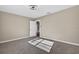 Bedroom featuring carpeted floors and overhead lighting at 1217 E 29Th Ave, Tampa, FL 33605