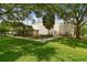 Well-maintained community center building with lush green lawn and mature trees offering a welcoming environment at 1217 E 29Th Ave, Tampa, FL 33605