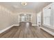Spacious living room with updated flooring, fresh paint and natural light at 1217 E 29Th Ave, Tampa, FL 33605