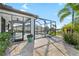 Inviting pool area with a screened enclosure and a beautiful patio at 12830 24Th Street E Cir, Parrish, FL 34219