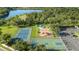 Community recreation area offering basketball and tennis courts as well as a playground near the lake at 12830 24Th Street E Cir, Parrish, FL 34219