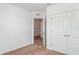 Bedroom with carpeted floors, bright walls, and access to closets and ensuite bathroom at 12841 Buffalo Run Dr, Gibsonton, FL 33534