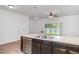 Kitchen view featuring a spacious countertop with a double sink and stainless steel dishwasher at 12841 Buffalo Run Dr, Gibsonton, FL 33534