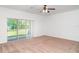 Living area featuring sliding glass doors to the backyard, providing ample natural light and outdoor views at 12841 Buffalo Run Dr, Gibsonton, FL 33534