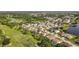 Aerial image displays home in community near golf course and lakes at 13003 Carlington Ln, Riverview, FL 33579