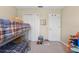 ' room with gray bunkbeds and toys at 13003 Carlington Ln, Riverview, FL 33579
