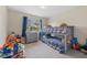 ' room with gray bunkbeds and toys at 13003 Carlington Ln, Riverview, FL 33579