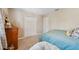 Bedroom with plush carpet and large closet doors at 13003 Carlington Ln, Riverview, FL 33579