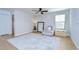 Bedroom featuring wood floors, and a cushioned bench with mirror at 13118 Payton St, Odessa, FL 33556