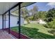 Spacious backyard featuring a shed and bordered by a wood fence, great for outdoor activities at 1402 Provincetown Cir, Lutz, FL 33549