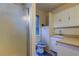 Bathroom featuring a stand up shower, vanity and toilet at 1402 Provincetown Cir, Lutz, FL 33549