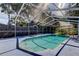 Private screened-in pool with a built-in stairway and ample sunshine at 1402 Provincetown Cir, Lutz, FL 33549