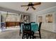 Screened in porch with table and swing at 1402 Provincetown Cir, Lutz, FL 33549