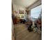 Cluttered room with lots of things and lots of natural light from the windows at 1420 36Th N Ave, St Petersburg, FL 33704