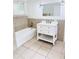 Bathroom with tub and vanity at 1507 W Le Compte Dr, Tampa, FL 33604