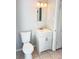 Bathroom featuring a modern vanity, mirror, and updated lighting fixtures at 1507 W Le Compte Dr, Tampa, FL 33604
