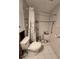 Recently renovated bathroom with tile shower, support bars, and new toilet installation at 1508 16Th Se Cir, Largo, FL 33771