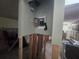 Shows the electrical panel and water damage inside a home under renovation at 1508 16Th Se Cir, Largo, FL 33771