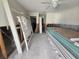 A stack of drywall is visible in the room undergoing renovation at 1508 16Th Se Cir, Largo, FL 33771