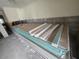 A stack of drywall is visible in the room undergoing renovation at 1508 16Th Se Cir, Largo, FL 33771