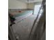 A stack of drywall is visible in the room undergoing renovation at 1508 16Th Se Cir, Largo, FL 33771