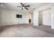 Spacious bedroom featuring a ceiling fan, closet, and television mounted to the wall at 1634 Acadia Harbor Pl, Brandon, FL 33511